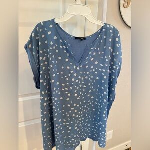 Blue and white polka dot blouse